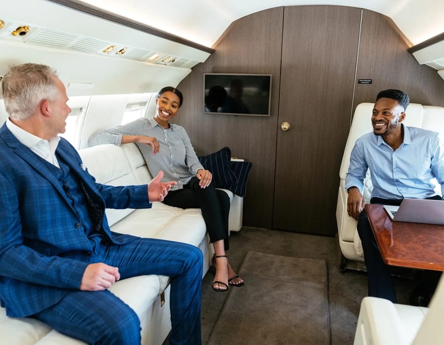 Luxury private jet cabin interior with leather seating — illustrative stock photo